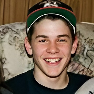 After Unmush: the same grinning boy, sharp