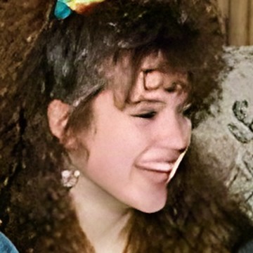 After the upscaler: her eyes and mouth smeared flat